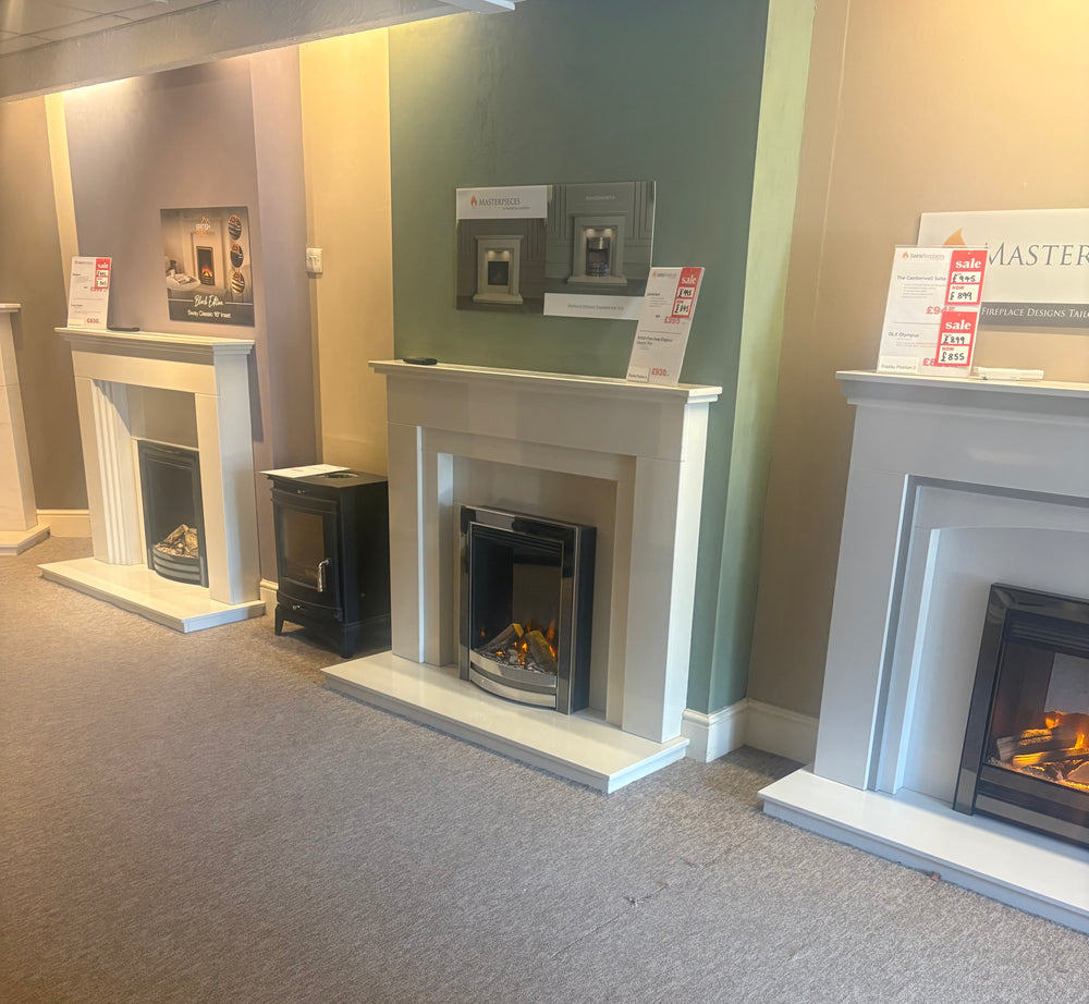 A row of fireplace surrounds inside the Bristol showroom