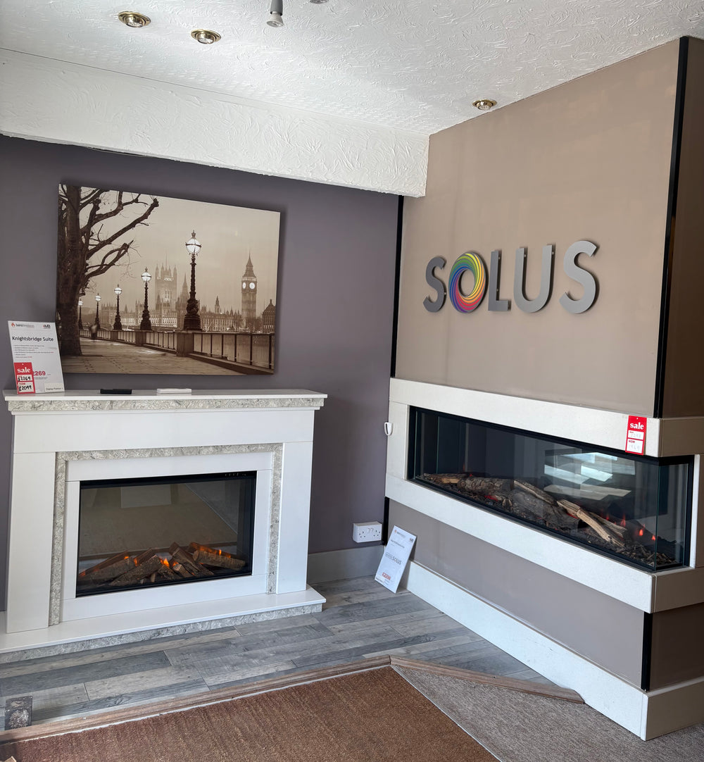 Fireplace and wide electric fire displays inside the Bristol showroom
